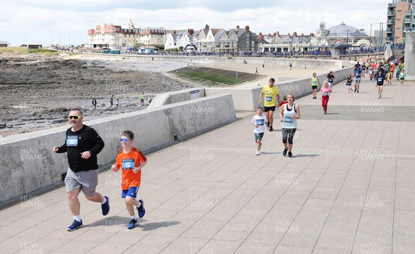 030722 - Run 4 Wales Healthspan Porthcawl 10k - Families take part in the Fun Run as the final event of the day