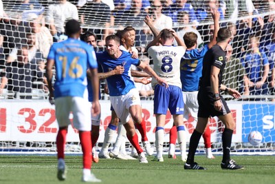 050926 - Portsmouth FC v Cardiff City - SkyBet Championship - Conor Shaughnessy of Portsmouth celebrates scoring a goal with team mates