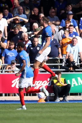 050926 - Portsmouth FC v Cardiff City - SkyBet Championship - Conor Shaughnessy of Portsmouth celebrates scoring a goal with team mates