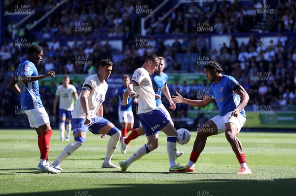 050926 - Portsmouth FC v Cardiff City - SkyBet Championship - Jack Moylan of Cardiff City is challenged by Benjamin Arthur of Portsmouth 