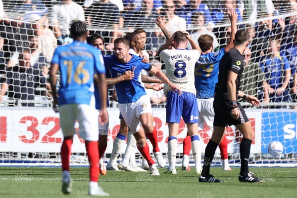 050926 - Portsmouth FC v Cardiff City - SkyBet Championship - Conor Shaughnessy of Portsmouth celebrates scoring a goal with team mates