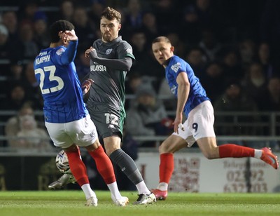 110225  Portsmouth v Cardiff City, EFL Sky Bet Championship - Calum Chambers of Cardiff City and Josh Murphy of Portsmouth compete for the ball