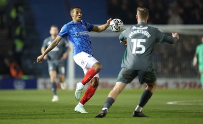 110225  Portsmouth v Cardiff City, EFL Sky Bet Championship - Isaac Hayden of Portsmouth and Sivert Mannsverk of Cardiff City compete for the ball