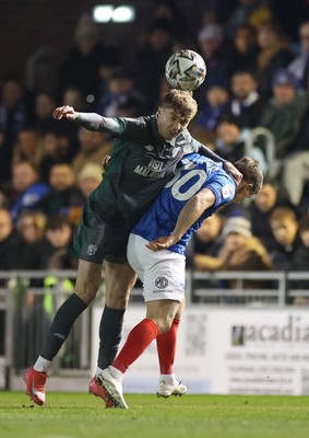 110225  Portsmouth v Cardiff City, EFL Sky Bet Championship - Joel Bagan of Cardiff City beats Matt Ritchie of Portsmouth to head the ball