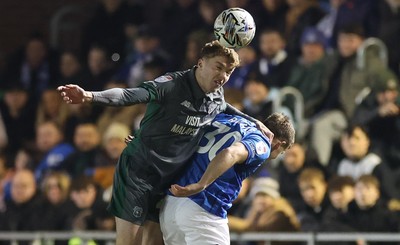 110225  Portsmouth v Cardiff City, EFL Sky Bet Championship - Joel Bagan of Cardiff City beats Matt Ritchie of Portsmouth to head the ball