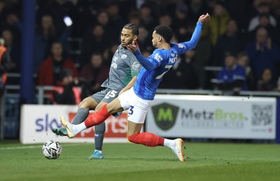 110225  Portsmouth v Cardiff City, EFL Sky Bet Championship - Andy Rinomhota of Cardiff City is challenged by Josh Murphy of Portsmouth