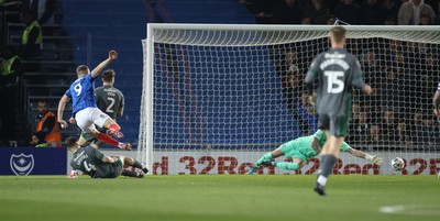 110225  Portsmouth v Cardiff City, EFL Sky Bet Championship - Colby Bishop of Portsmouth beats Cardiff City goalkeeper Jak Alnwick to score goal