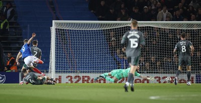 110225  Portsmouth v Cardiff City, EFL Sky Bet Championship - Colby Bishop of Portsmouth beats Cardiff City goalkeeper Jak Alnwick to score goal