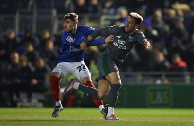 110225  Portsmouth v Cardiff City, EFL Sky Bet Championship - Callum Robinson of Cardiff City tangles with Zak Swanson of Portsmouth