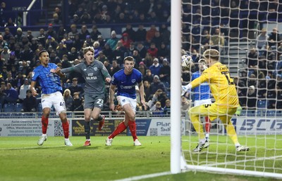 110225  Portsmouth v Cardiff City, EFL Sky Bet Championship - Portsmouth goalkeeper Nicolas Schmid  saves from Joel Bagan of Cardiff City