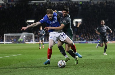 110225  Portsmouth v Cardiff City, EFL Sky Bet Championship - Callum O'Dowda of Cardiff City and Terry Devlin of Portsmouth compete for the ball