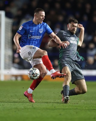 110225  Portsmouth v Cardiff City, EFL Sky Bet Championship - Colby Bishop of Portsmouth and Dimitris Goutas of Cardiff City compete for the ball