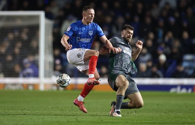 110225  Portsmouth v Cardiff City, EFL Sky Bet Championship - Colby Bishop of Portsmouth and Dimitris Goutas of Cardiff City compete for the ball