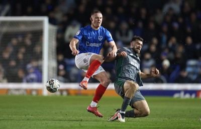 110225  Portsmouth v Cardiff City, EFL Sky Bet Championship - Colby Bishop of Portsmouth and Dimitris Goutas of Cardiff City compete for the ball