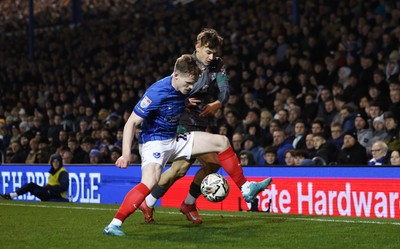 110225  Portsmouth v Cardiff City, EFL Sky Bet Championship - Terry Devlin of Portsmouth and Will Alves of Cardiff City compete for the ball