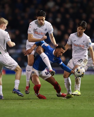 100326 - Portsmouth v Swansea City, EFL Sky Bet Championship - Jacob Brown of Portsmouth is challenged by Marko Stamenic of Swansea City