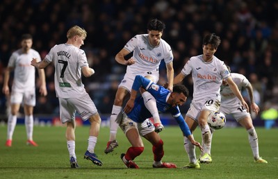 100326 - Portsmouth v Swansea City, EFL Sky Bet Championship - Jacob Brown of Portsmouth is challenged by Marko Stamenic of Swansea City