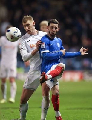 100326 - Portsmouth v Swansea City, EFL Sky Bet Championship - Conor Chaplin of Portsmouth clears under pressure from Jay Fulton of Swansea City