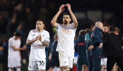 100326 - Portsmouth v Swansea City, EFL Sky Bet Championship - Ronald of Swansea City and Ben Cabango of Swansea City at the end of the match