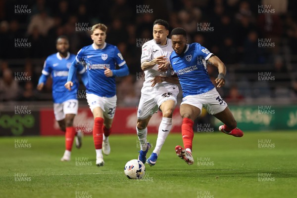 100326 - Portsmouth v Swansea City, EFL Sky Bet Championship - Ronald of Swansea City and Ebou Adams of Portsmouth compete for the ball