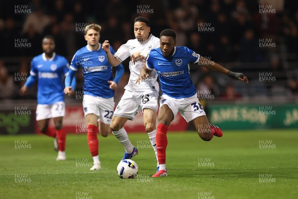 100326 - Portsmouth v Swansea City, EFL Sky Bet Championship - Ronald of Swansea City and Ebou Adams of Portsmouth compete for the ball