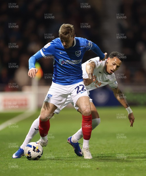 100326 - Portsmouth v Swansea City, EFL Sky Bet Championship - Zak Swanson of Portsmouth is challenged by Ronald of Swansea City