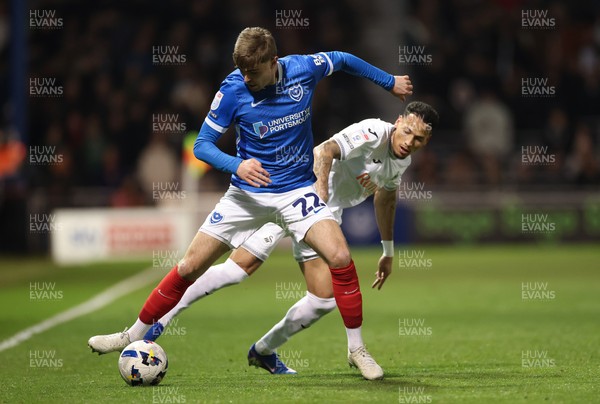 100326 - Portsmouth v Swansea City, EFL Sky Bet Championship - Zak Swanson of Portsmouth is challenged by Ronald of Swansea City