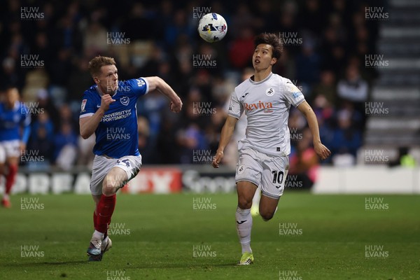 100326 - Portsmouth v Swansea City, EFL Sky Bet Championship - Jisung Eom of Swansea City and Terry Devlin of Portsmouth compete for the ball