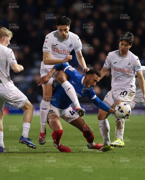 100326 - Portsmouth v Swansea City, EFL Sky Bet Championship - Jacob Brown of Portsmouth is challenged by Marko Stamenic of Swansea City