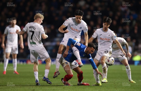 100326 - Portsmouth v Swansea City, EFL Sky Bet Championship - Jacob Brown of Portsmouth is challenged by Marko Stamenic of Swansea City