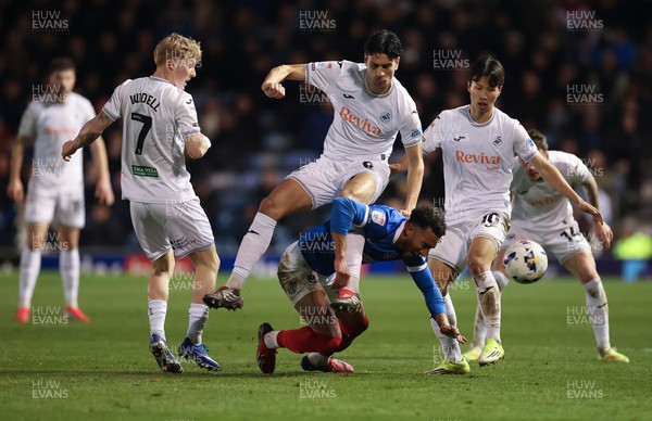100326 - Portsmouth v Swansea City, EFL Sky Bet Championship - Jacob Brown of Portsmouth is challenged by Marko Stamenic of Swansea City