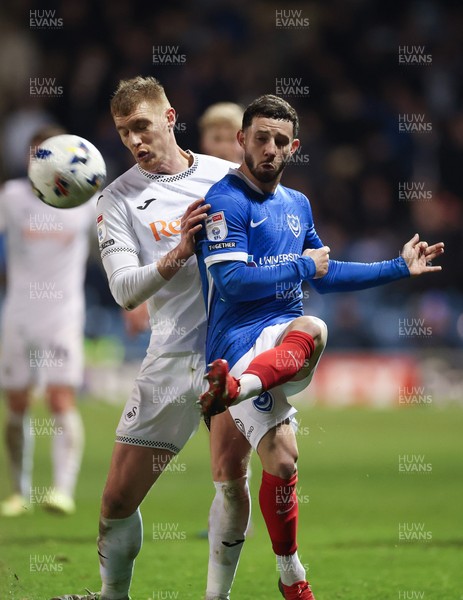 100326 - Portsmouth v Swansea City, EFL Sky Bet Championship - Conor Chaplin of Portsmouth clears under pressure from Jay Fulton of Swansea City