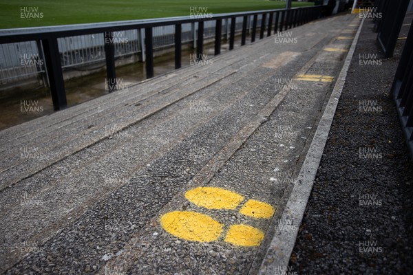 160521 - Picture shows markings painted on the terraces at Rodney Parade, home of Newport County ready for the return of fans at their play off match this Tuesday