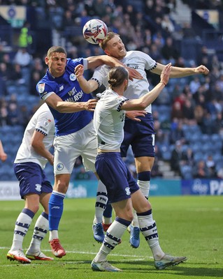 080425 - Preston North End v Cardiff City - Sky Bet Championship - Yousef Saleh of Cardiff is sandwiched between Lewis Gibson of Preston North End and Will Keane of Preston North End as he tries to receive the corner ball