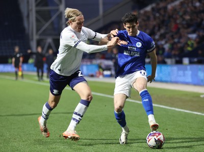 080425 - Preston North End v Cardiff City - Sky Bet Championship - Callum O'Dowda of Cardiff is caught by Stefan Teitur Poroarson of Preston North End