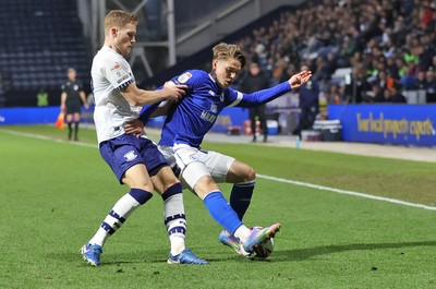 080425 - Preston North End v Cardiff City - Sky Bet Championship - Cian Ashford of Cardiff is caught by Lewis Gibson of Preston North End