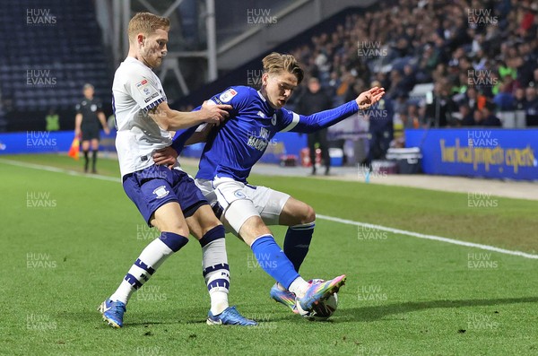 080425 - Preston North End v Cardiff City - Sky Bet Championship - Cian Ashford of Cardiff is caught by Lewis Gibson of Preston North End