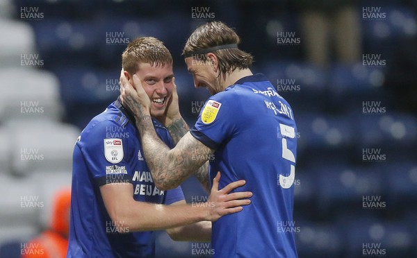 201121 - Preston North End v Cardiff City - Sky Bet Championship - Mark McGuiness of Cardiff celebrates with Aden Flint of Cardiff