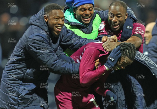 251123 - Preston North End v Cardiff City - Sky Bet Championship - Ike Ugbo of Cardiff is mobbed by Ebou Adams of Cardiff, Yakou Meite of Cardiff and Mahlon Romeo of Cardiff