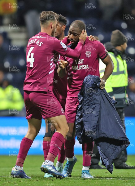 251123 - Preston North End v Cardiff City - Sky Bet Championship - Demitrios Goutas of Cardiff calms down Yakou Meite of Cardiff at the end of the match