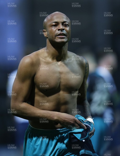 010220 - Preston North End v Swansea City - Sky Bet Championship - Andre Ayew of Swansea applauds the fans at the end of the match and strips to give his shirt to a fan   