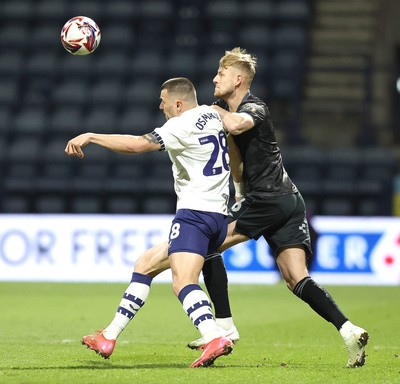 040325 - Preston North End v Swansea City - Sky Bet Championship - Harry Darling of Swansea and Milton Osmotic of Preston North End