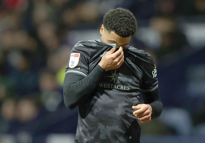 040325 - Preston North End v Swansea City - Sky Bet Championship - Myles Peart-Harris of Swansea leaves the pitch injured