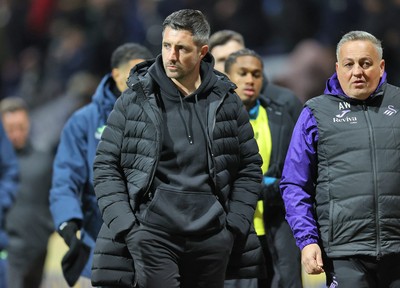 040325 - Preston North End v Swansea City - Sky Bet Championship - Swansea manager Alan Sheehan comes off the pitch at half time