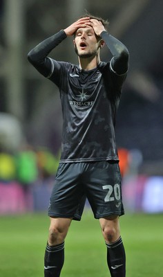 040325 - Preston North End v Swansea City - Sky Bet Championship - Liam Cullen of Swansea rues missed chance