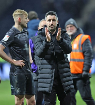 040325 - Preston North End v Swansea City - Sky Bet Championship - Swansea manager Alan Sheehan gives applause at the end of the match