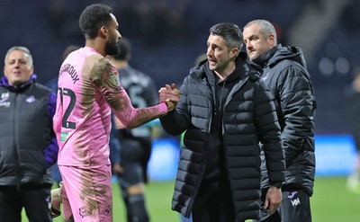 040325 - Preston North End v Swansea City - Sky Bet Championship - Swansea manager Alan Sheehan with Lawrence Vigouroux of Swansea  at the end of the match 