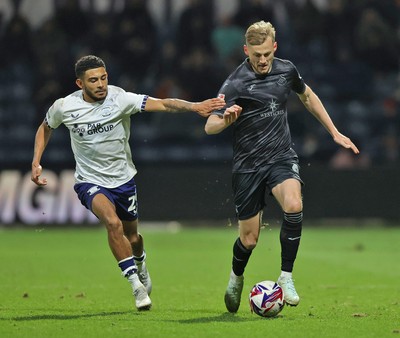 040325 - Preston North End v Swansea City - Sky Bet Championship - Harry Darling of Swansea and Kaine Kesler-Hayden of Preston North End