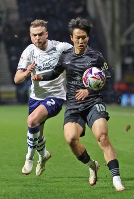 040325 - Preston North End v Swansea City - Sky Bet Championship - Eom Ji-sung of Swansea and Ryan Porteous of Preston North End