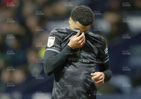 040325 - Preston North End v Swansea City - Sky Bet Championship - Myles Peart-Harris of Swansea leaves the pitch injured